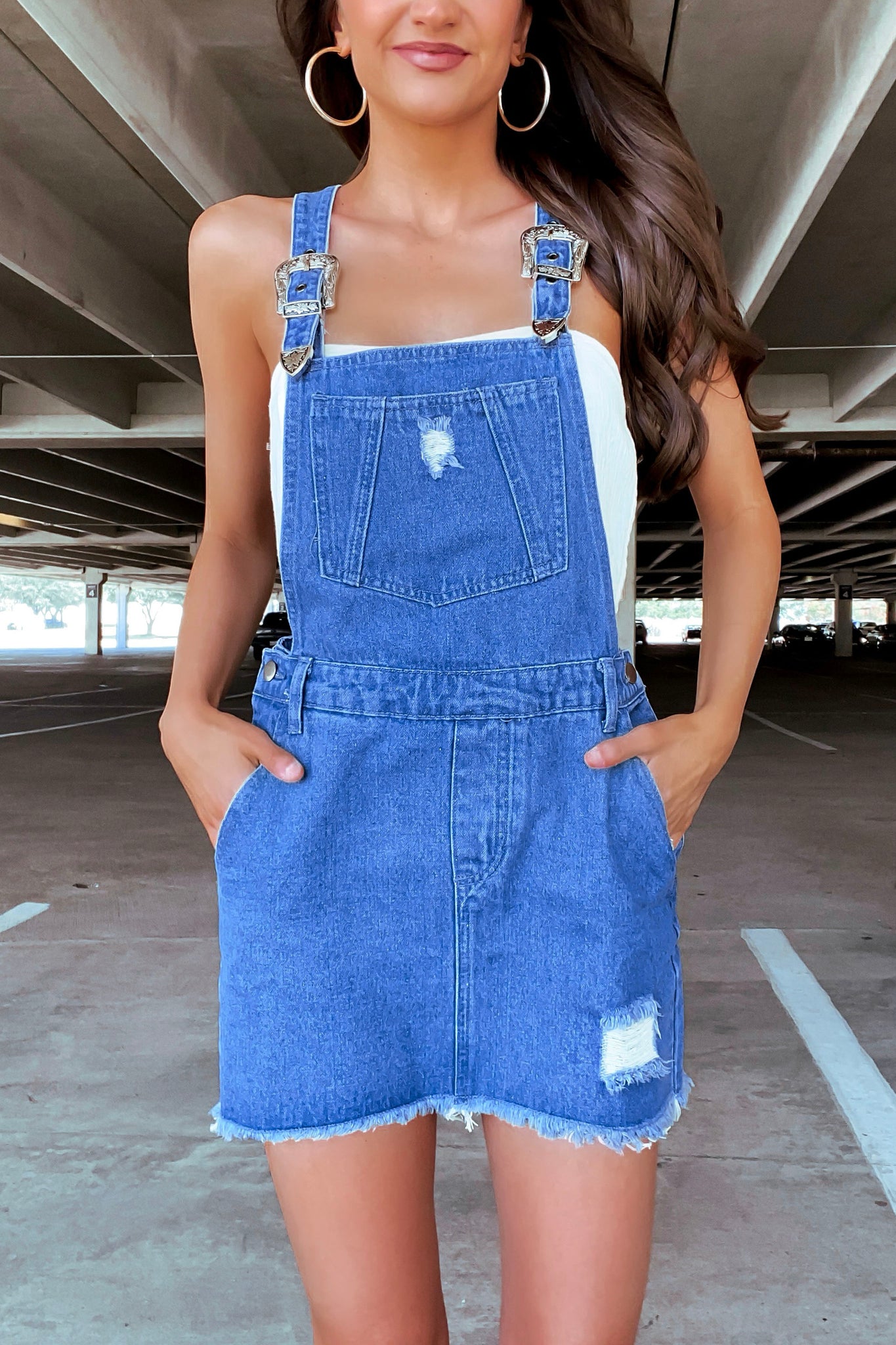 Women's Blue Denim Overall Dress, Pink Crew-neck T-shirt, White Canvas Low  Top Sneakers, Pink Leather Crossbody Bag | Lookastic